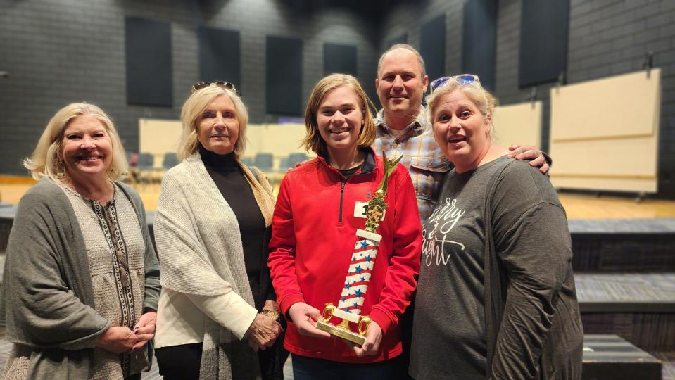 Randall County Spelling Bee Champion Jensen Betzen and his family celebrate his victory Friday in the competition held at Canyon Intermediate School.