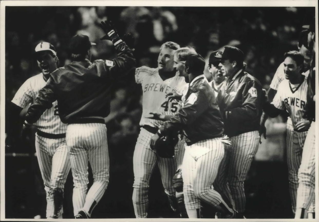 Rob Deer (45) is congratulated by his Milwaukee Brewer teammates after hitting the game-winning home run April 24, 1989.