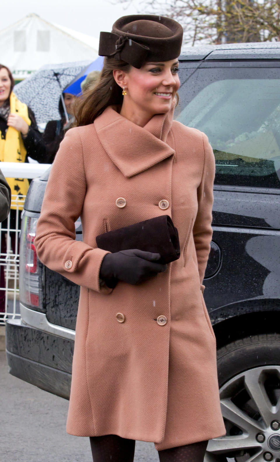 Middleton attends the Cheltenham in London, England, wearing a blush pink MaxMara coat.