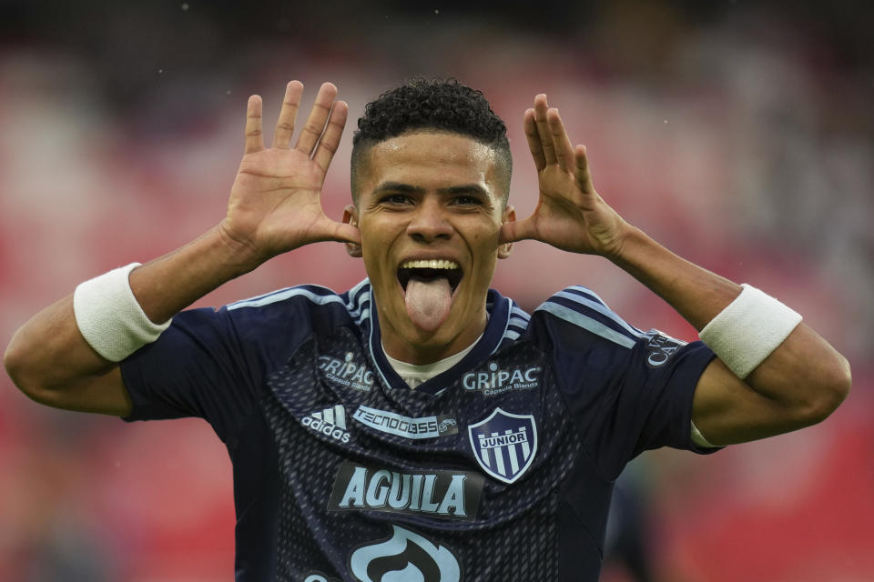 Jose Enamorado of Colombia's Junior celebrates scoring his side's opening goal against Ecuador's Liga Deportiva Universitaria during a Copa Libertadores Group D soccer match at the Rodrigo Paz Delgado stadium in Quito, Ecuador, Tuesday, May 14, 2024. (AP Photo/Dolores Ochoa)