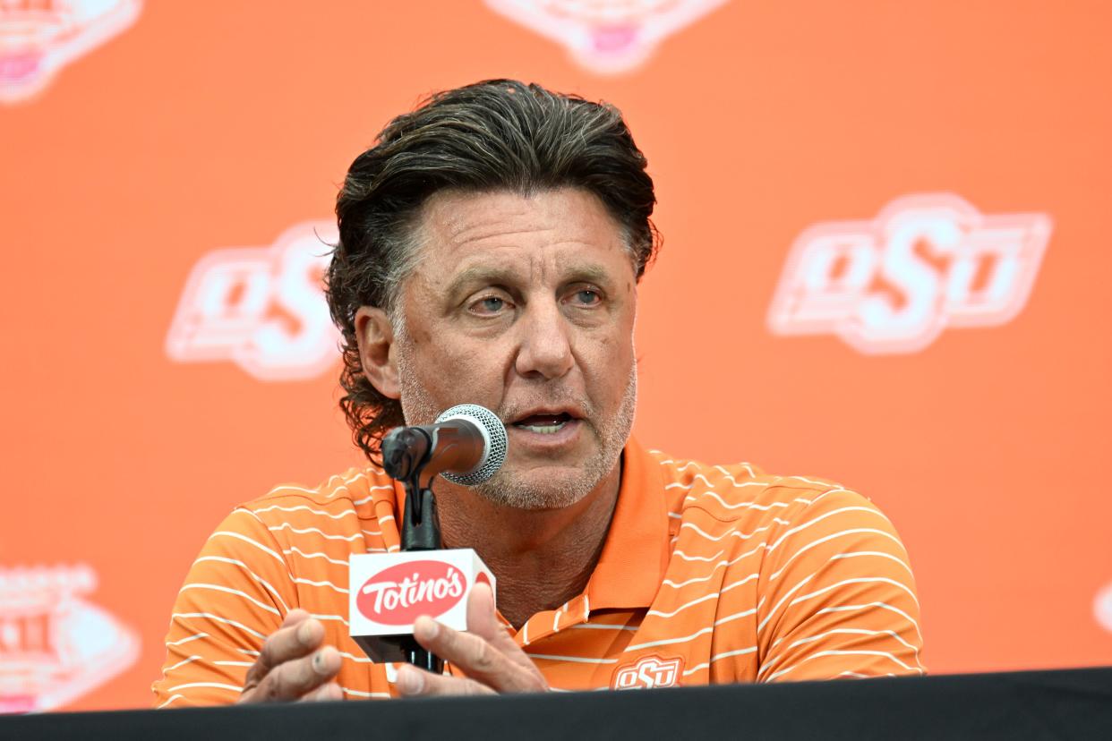 Oklahoma State football coach Mike Gundy speaks to the media during the Big 12 Media Days on Tuesday at Allegiant Stadium in Las Vegas.