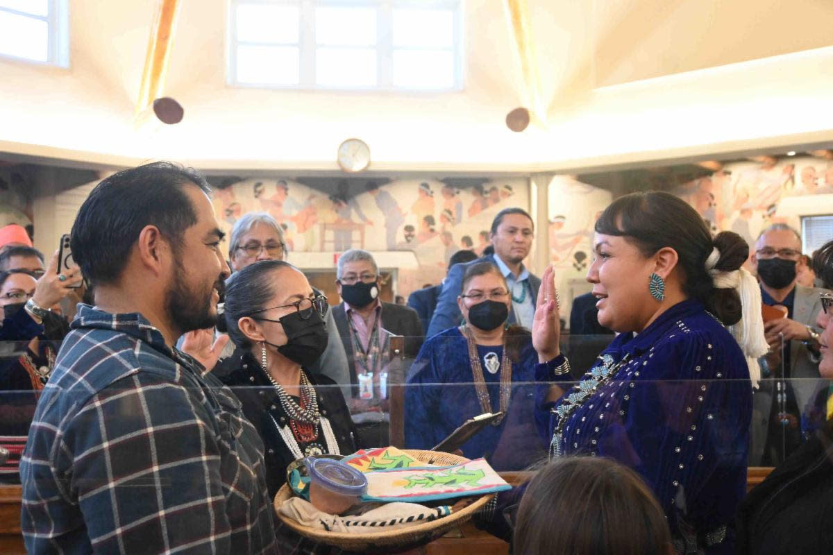 Navajo Nation Chief Justice JoAnn Jayne administering the Oath of Office to Madam Speaker Crystalyne Curley (right) in the Navajo Nation Council Chamber.