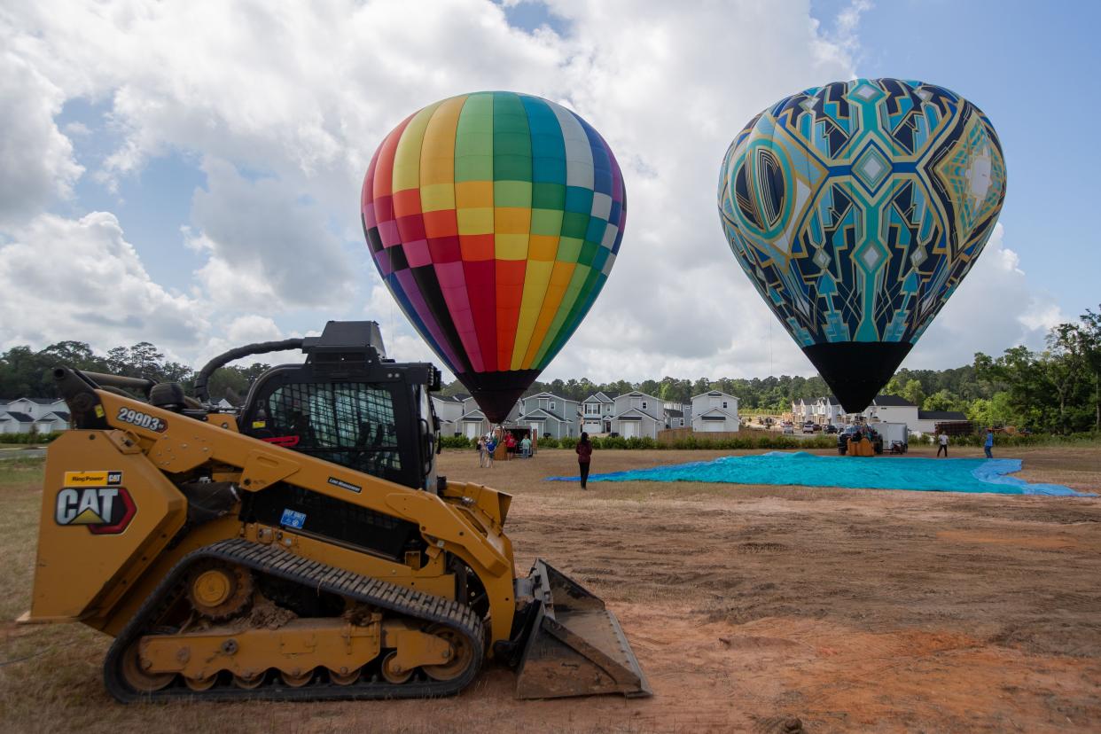 Hot air balloons were inflated in the background of a groundbreaking ceremony held for the new Senior Center on Wednesday, May 1, 2024.