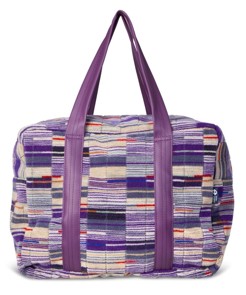 A bag featuring the Elizabeth Line’s purple moquette. (London Transport Museum/TfL)