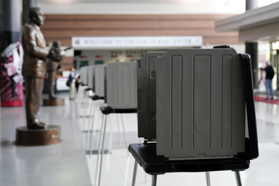 Privacy booths are seen at a satellite election office at Temple University's Liacouras Center, on Sept. 29, 2020, in Philadelphia. Pennsylvania is one of this year's most hotly contested battleground states and also is facing a flurry of lawsuits, complaints and partisan finger-pointing over its election procedures and systems. (AP Photo/Matt Slocum)