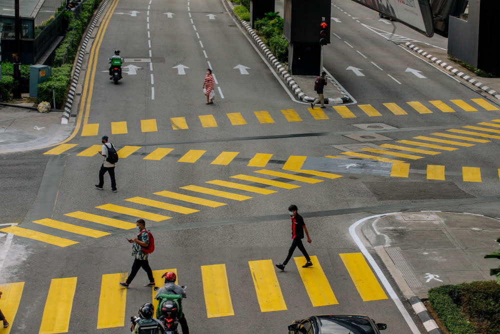 General view of New scramble pedestrian crossing in Bukit Bintang June 18, 2021. The Scramble Pedestrian crossing will allow pedestrians from all directions to cross, at the same time. — Picture by Firdaus Latif