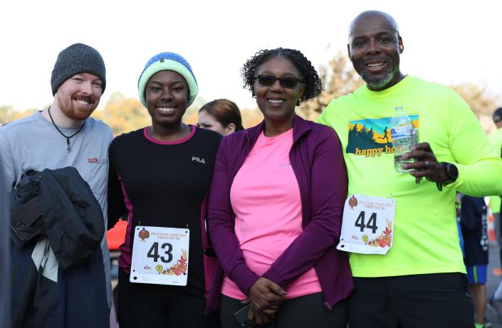 Family and friends came out to support Asia Conley and Vincent Conley as they participated in the 18th Annual Turkey Day 5K sponsored by Gold's Gym and Fleet Feet on Thursday, November 24, 2022, in Jackson, Tennessee.  Over 600 runners participate in the event each year which is held to benefit the Regional Inter-faith Association (RIFA).