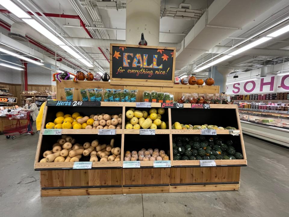 A fall seasonal display of gourds at Trader Joe's.