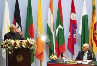 India's Prime Minister Narendra Modi (L) speaks as Afghanistan's President Ashraf Ghani watches during the opening session of 18th South Asian Association for Regional Cooperation (SAARC) summit in Kathmandu November 26, 2014. REUTERS/Narendra Shrestha/Pool