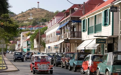 Boutiques on the main street in Gustavia, St. Barts - Credit: Getty