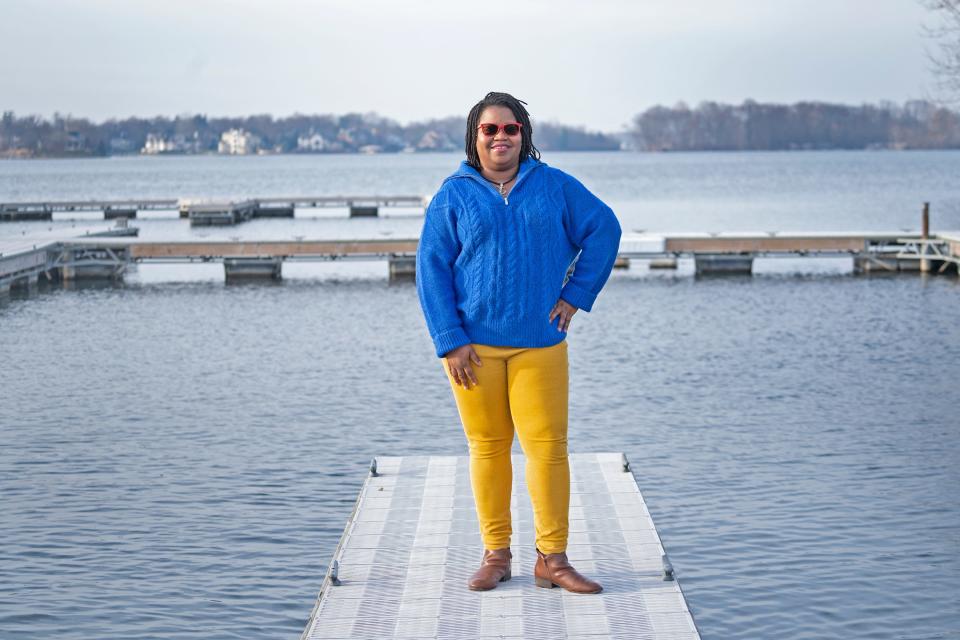 Youth Empowered Inc. Executive Director Charity Lewis finds peace as she sits at the Indianapolis Sailing Club boat docks Tuesday, Dec. 13, 2022 on Geist Reservoir. Youth Empowered works with youth from across the city using unconventional learning opportunities. They reconnect urban youth with nature including activities like camping, hiking, bird watching and sailing. "Nature helps young people to have peace," says Lewis, "serenity, physical and mental health and well-being." The group also explores significant Black people in a return to where Black people have historically always been engaged, she says.