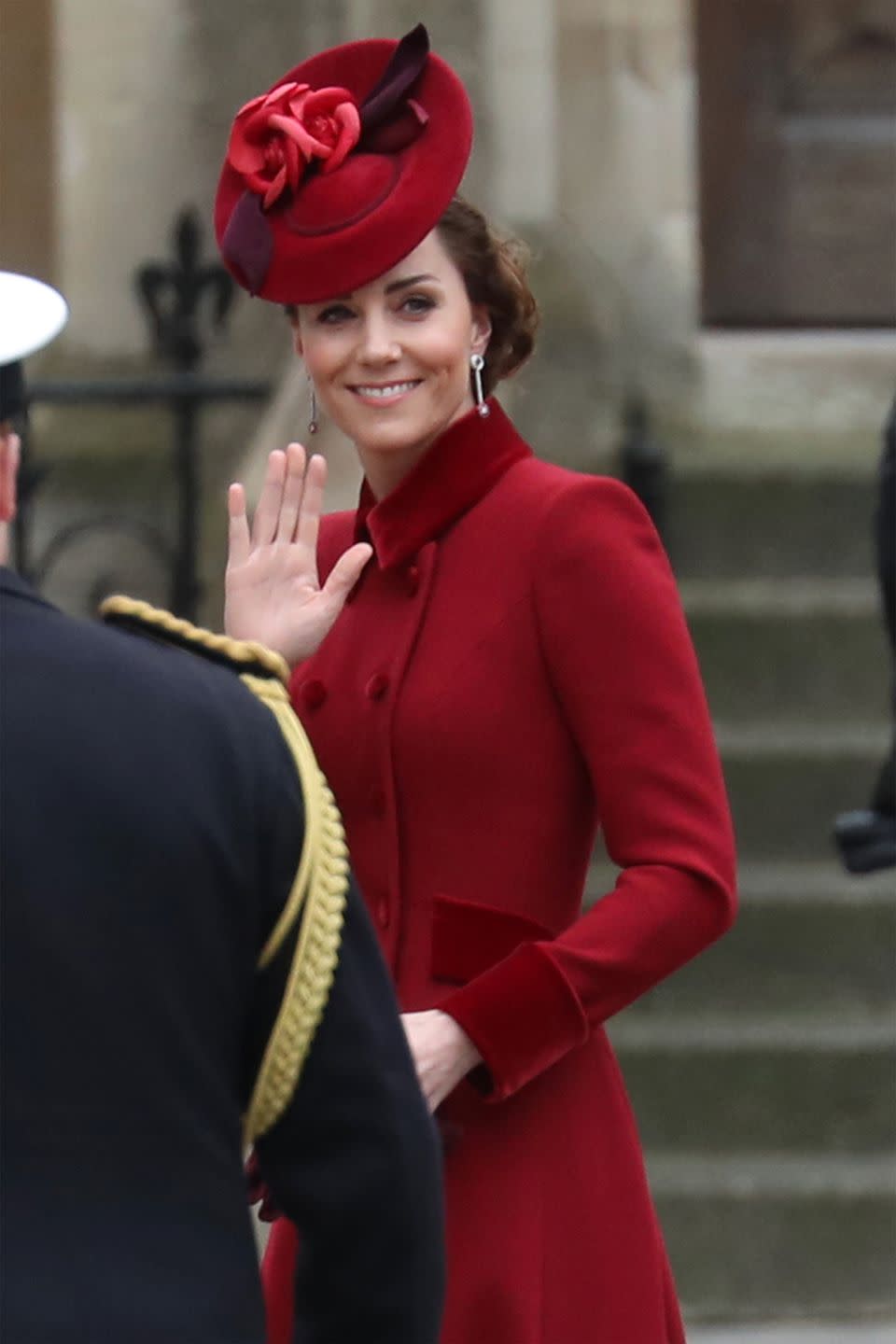 <p><a href="https://www.harpersbazaar.com/celebrity/latest/a31251072/kate-middleton-red-coat-commonwealth-day-2020/" rel="nofollow noopener" target="_blank" data-ylk="slk:Kate's burgundy outfit;elm:context_link;itc:0;sec:content-canvas" class="link ">Kate's burgundy outfit</a> includes a coat by Catherine Walker (which she also wore on Christmas in 2018), a rose-accented hat, a burgundy clutch and gloves, and a pair of wine-colored heeled pumps.</p>