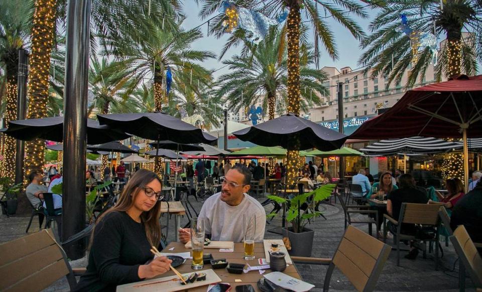 Dalila Ceschini and Shaun Otey enjoy a sushi dinner at Giralda Plaza in the heart of Coral Gables.