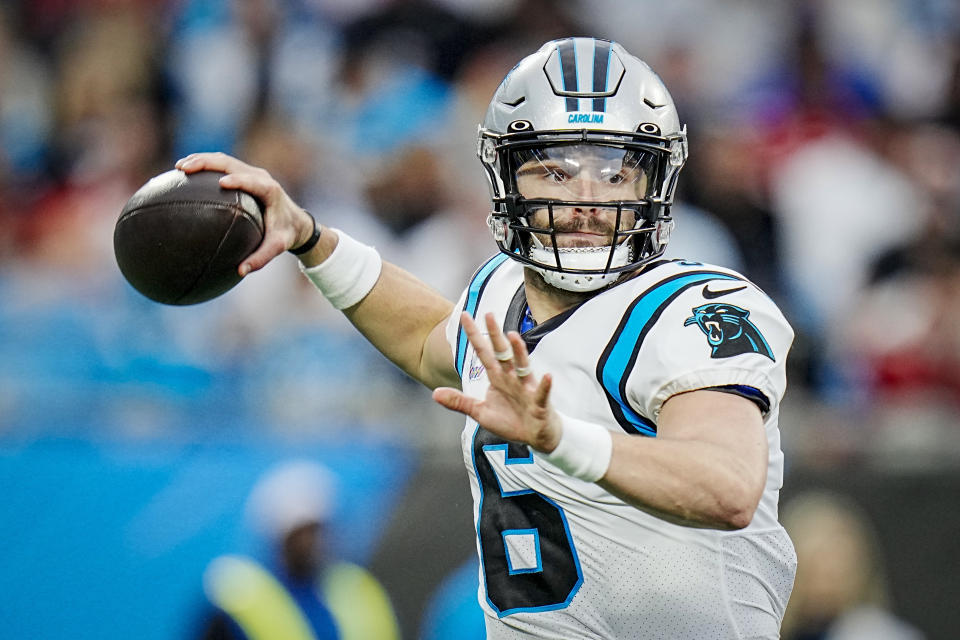 FILE - Carolina Panthers quarterback Baker Mayfield looks to pass during an NFL football game against the San Francisco 49ers, Oct. 9, 2022, in Charlotte, N.C. Mayfield has said he does not want to be traded and is trying his best to be supportive as the team's No. 2 quarterback behind starting P.J. Walker. (AP Photo/Rusty Jones, File)