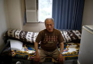 Sumitaka Haraguchi sits on a bed in a room of a nursing home where he lives during an interview with Reuters in Yokosuka, Japan September 11, 2018. Picture taken September 11, 2018. REUTERS/Kim Kyung-Hoon