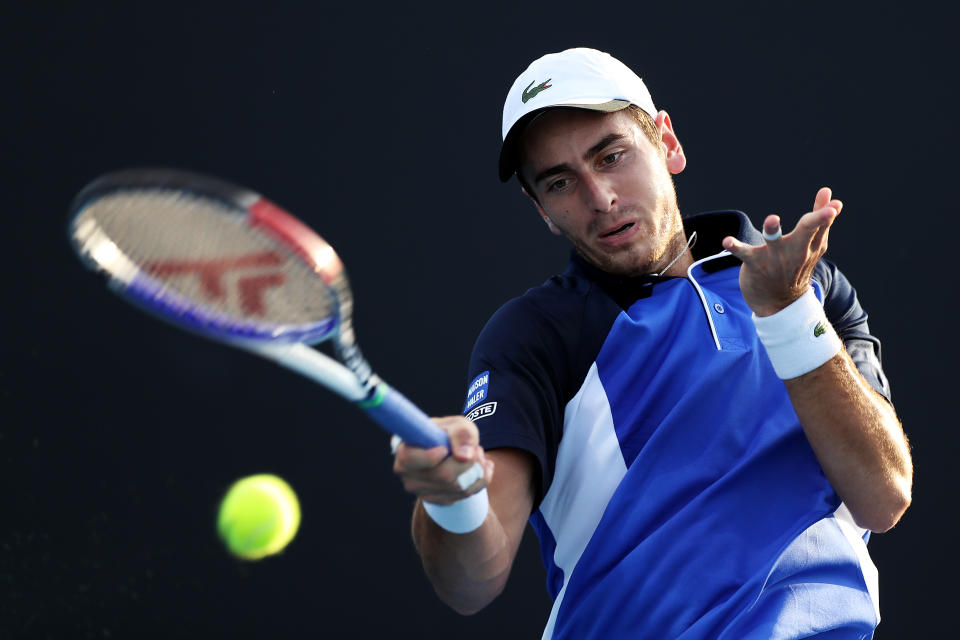 MELBOURNE, AUSTRALIA - JANUARY 21:  Elliot Benchetrit of France plays a forehand during his Men's Singles first round match against Yuichi Sugita of Japan on day two of the 2020 Australian Open at Melbourne Park on January 21, 2020 in Melbourne, Australia. (Photo by Mark Kolbe/Getty Images)