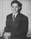 <p>Three days before he ran away from Boys Town in Omaha, Charles Manson poses in a suit and tie. (Photo: Bettmann Archive/Getty Images) </p>