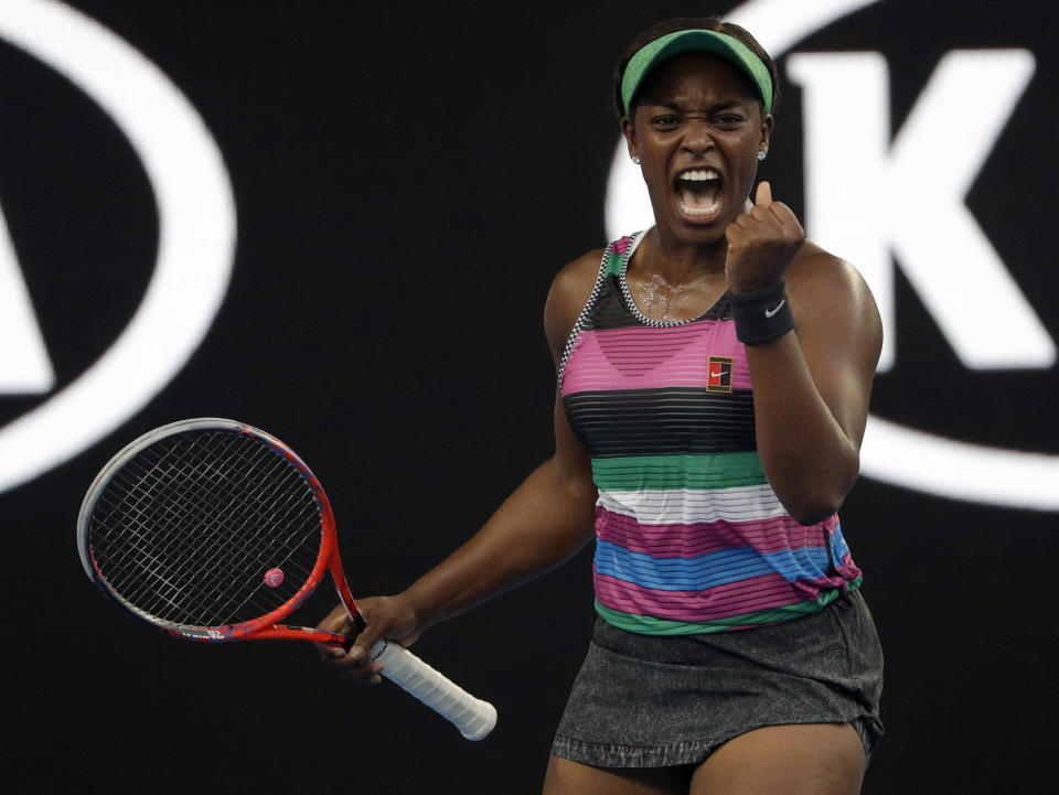 United States' Sloane Stephens celebrates after winning the first set against Croatia's Petra Martic during their third round match at the Australian Open tennis championships in Melbourne, Australia, Friday, Jan. 18, 2019. (AP Photo/Mark Schiefelbein)