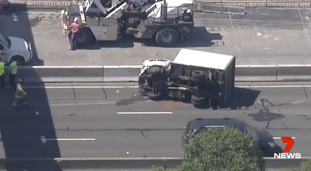 The couple travelling in the moving truck said it was sideswiped by a larger vehicle. Photo: 7 News