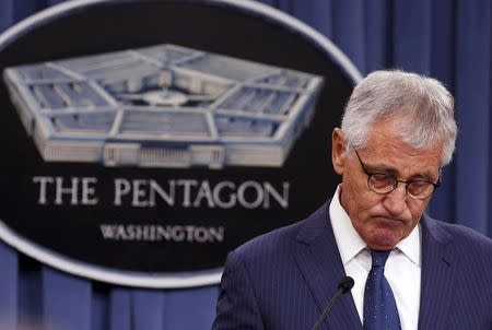 Then-U.S. Secretary of Defense Chuck Hagel pauses during a news conference at the Pentagon in Washington, in this January 22, 2015 file photo. REUTERS/Larry Downing/Files