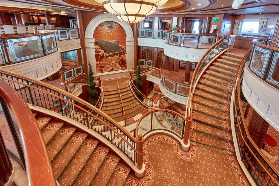 The Grand Lobby staircase on board a Cunard cruise ship