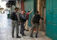 Two police killed near Jerusalem holy site, attackers shot dead