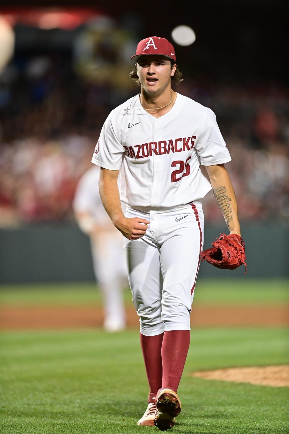 Arkansas relief pitcher Brady Tygart celebrates while coming off the mound in a game against Vanderbilt on May 13, 2022, at Baum-Walker Stadium.