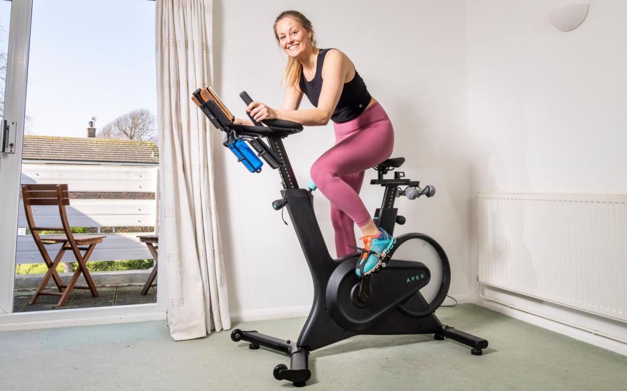 Maddi Howell on the Apex exercise bike - Andrew Crowley/The Telegraph