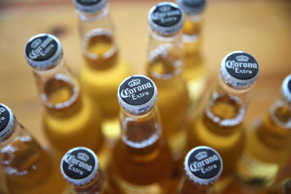 El Grupo Modelo y su internacionalmente conocida cerveza Corona han terminado en manos de la multinacional Anheuser-Busch InBev. Foto: AFP Photo/Scott Olson.