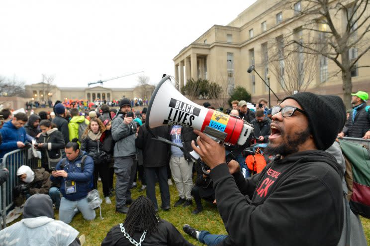 Protesters chain themselves to each other and block an entry point prior at the inauguration of U.S. President-elect Donald Trump in Washington, DC, U.S., January 20, 2017. Photo from Reuters