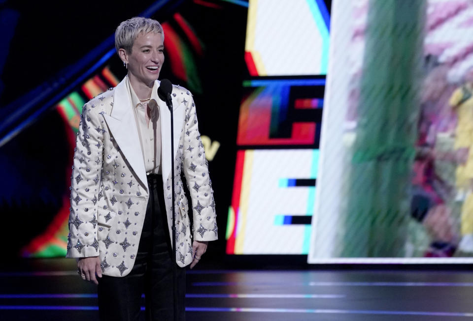 NWSL player Megan Rapinoe, of OL Reign, accepts the award for best play at the ESPY Awards on Wednesday, July 20, 2022, at the Dolby Theatre in Los Angeles. (AP Photo/Mark Terrill)