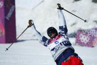 Gus Kenworthy of the U.S. reacts on the finish line during the men's freestyle skiing slopestyle finals at the 2014 Sochi Winter Olympic Games in Rosa Khutor, February 13, 2014. REUTERS/Mike Blake