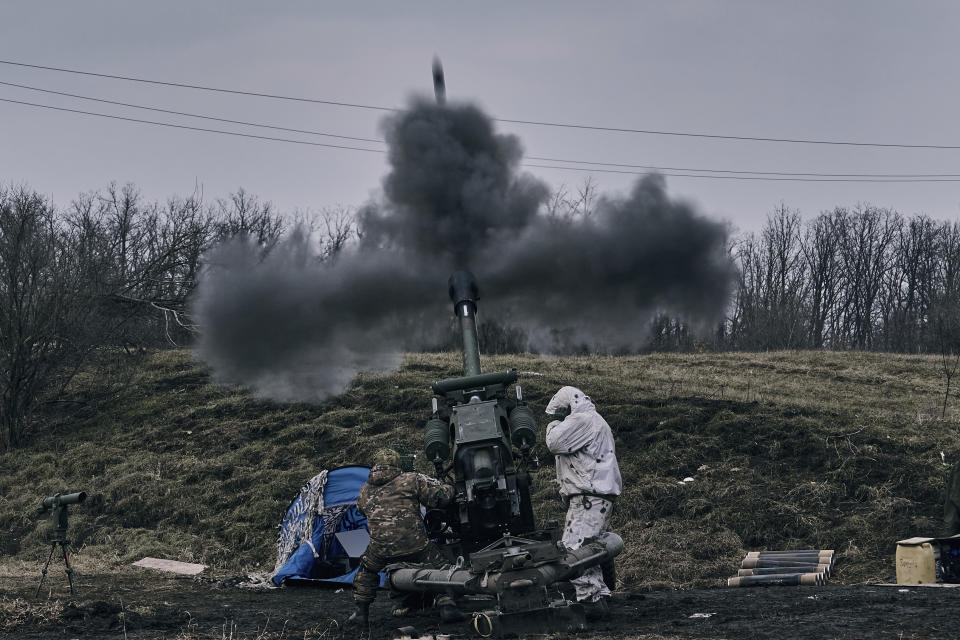 FILE - Ukrainian soldiers fire a self-propelled howitzer towards Russian positions near Bakhmut, the site of the heaviest battles, Donetsk region, Ukraine, on March 7, 2023. When Russia invaded Ukraine in February 2022, Ukraine’s military was largely reliant on Soviet-era weaponry. While that arsenal helped Ukraine fend off an assault on the capital of Kyiv and prevent a total rout in the early weeks of the war, billions of dollars in military assistance has since poured into the country, including more modern Western-made weapons. (AP Photo/Libkos, File)