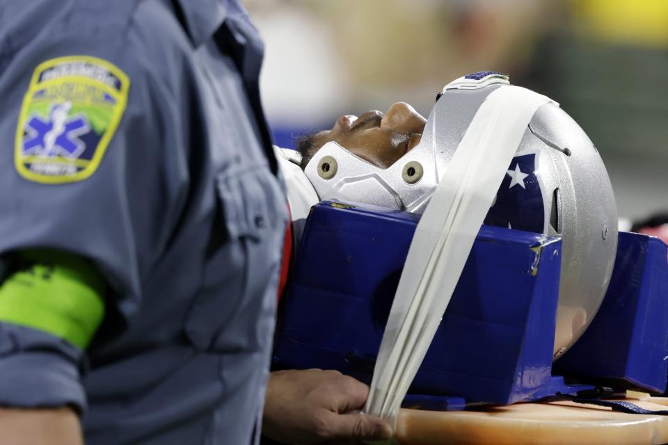 New England Patriots cornerback Isaiah Bolden is brought off the field after being injured during the second half of a preseason NFL football game against the Green Bay Packers, Saturday, Aug. 19, 2023, in Green Bay, Wis. The game was suspended after the injury. (AP Photo/Matt Ludtke)