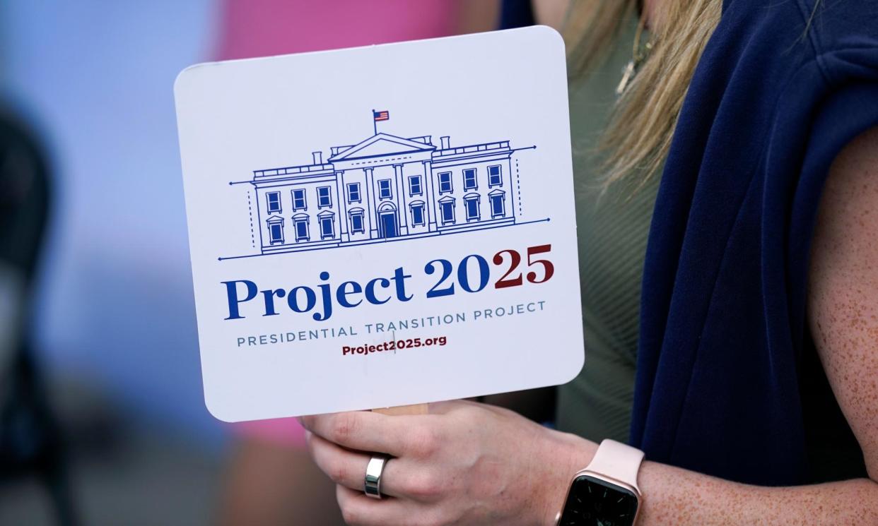 <span>A Project 2025 fan at the Iowa State Fair in Des Moines, on 14 August 2023.</span><span>Photograph: Charlie Neibergall/AP</span>