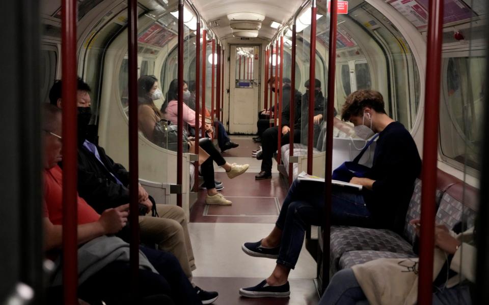 Masks have been a common sight in public for much of the coronavirus pandemic - Matt Dunham/AP