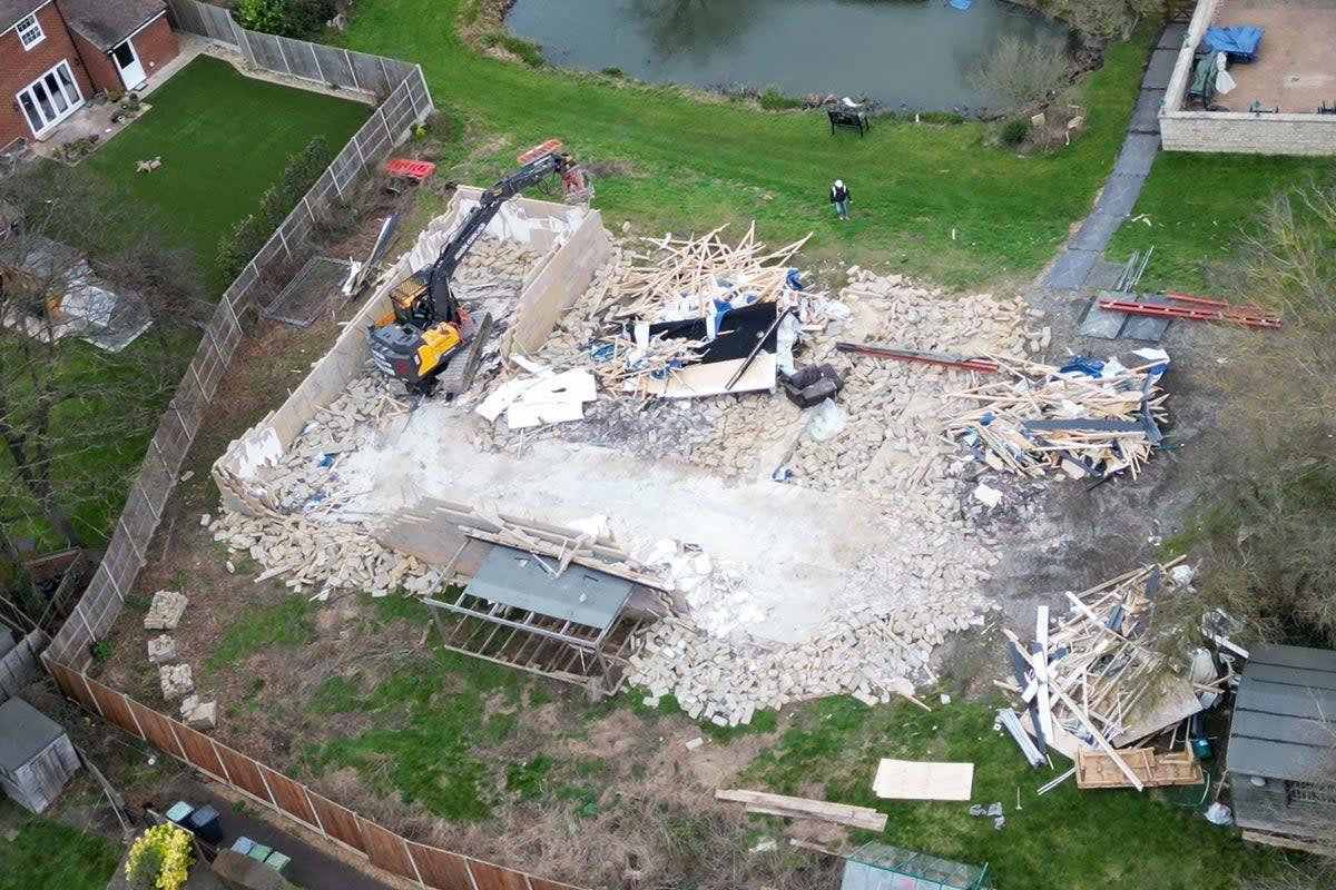 Work taking place on Monday to demolish the unauthorised spa pool block (PA)