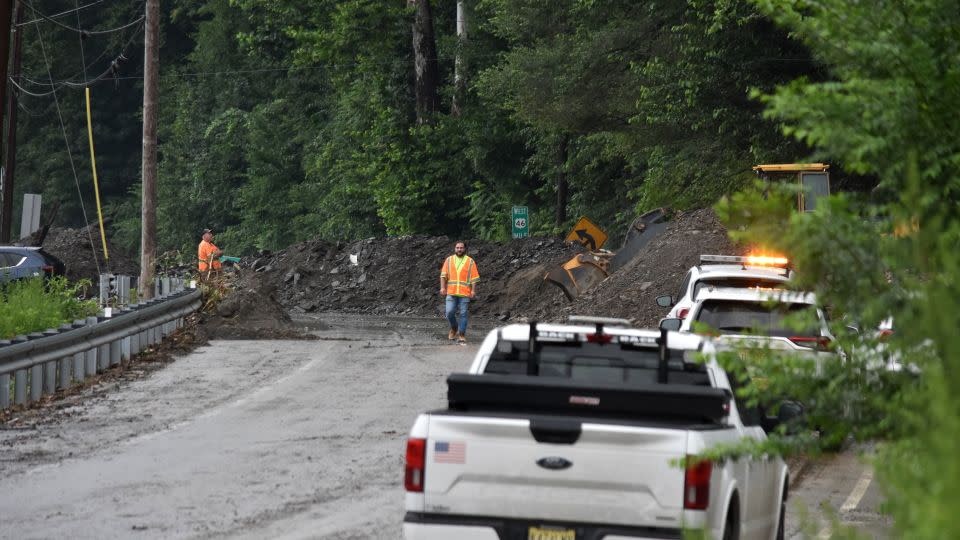 Municipal workers conduct cleaning work after landslide following heavy rains in New Jersey. - Kyle Mazza/Anadolu Agency/Getty Images