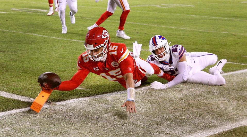 Chiefs quarterback Patrick Mahomes dives into the end zone  for an 8-yard touchdown against the Bills Micah Hyde.  The Chiefs won 42-36 in overtime. This photo goes back to January during what may be one of the overall greatest football games I’ve seen. The Chiefs  overtime win against the Bills in last season’s playoffs was simply fun to watch regardless of who you were rooting for. Most sports are photographed using longs lenses, so, on the rare occasion I can make a meaningful sports photo with a wide angle lens, I’m always excited. 