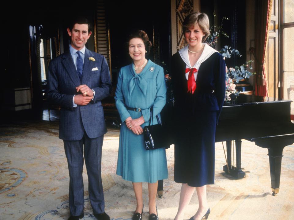 Prince Charles and Diana Spencer with Queen Elizabeth II at Buckingham Palace on March 7, 1981