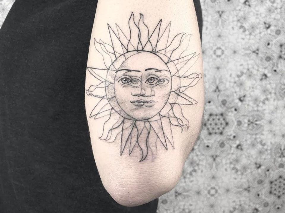 Yatzil double vision tattoo sun