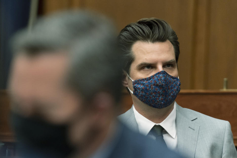 Rep. Matt Gaetz, R-Fla., looks at the video monitor during a House Armed Services Committee hearing on Capitol Hill, Wednesday, April 14, 2021, in Washington. (AP Photo/Manuel Balce Ceneta)