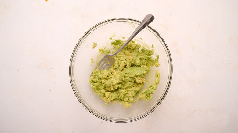 smashed avocado in bowl