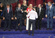 Soccer Football - World Cup - Final - France v Croatia - Luzhniki Stadium, Moscow, Russia - July 15, 2018 Croatia coach Zlatko Dalic shakes hands with Croatia President Kolinda Grabar-Kitarovic REUTERS/Christian Hartmann