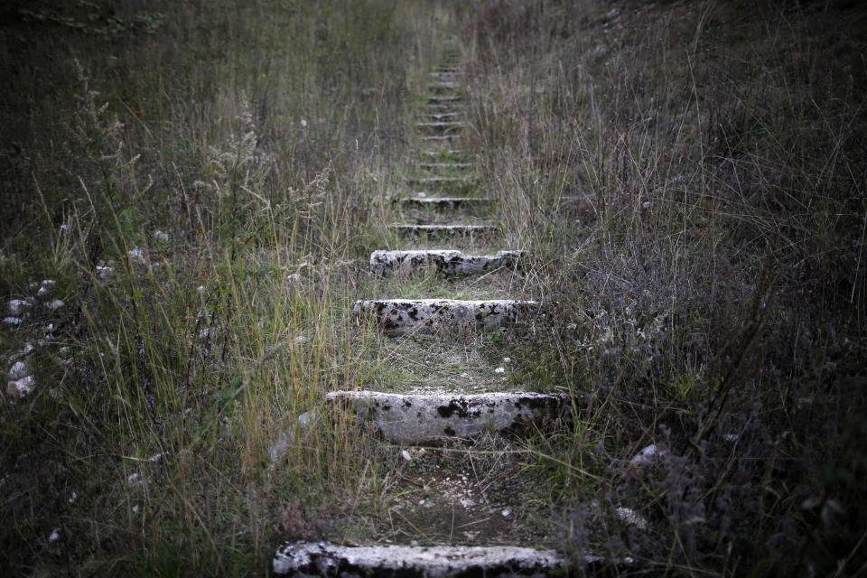 A view of worn stone steps which lead to the disused ski jump from the Sarajevo 1984 Winter Olympics on Mount Igman, near Sarajevo