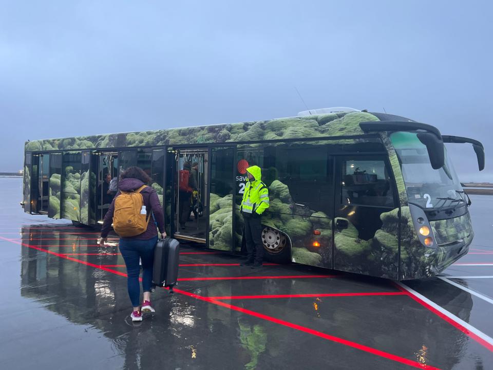 bus in the rain to get to connecting icelandair flight