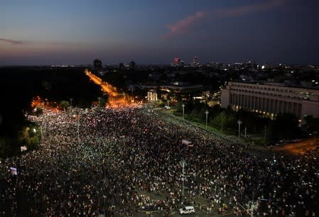 Thousands of people protest against the Romanian government in central Bucharest