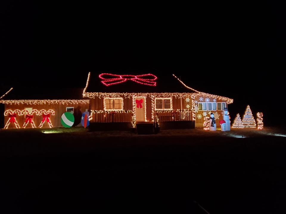 Matt and Sarah Scott’s large assortment of holiday decorations are mostly handmade. Their display is designed to be as attractive in the daytime as it is lit-up at night.