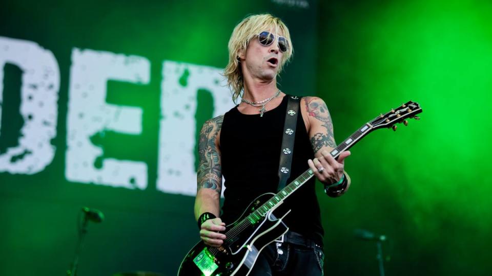 Duff McKagan playing guitar