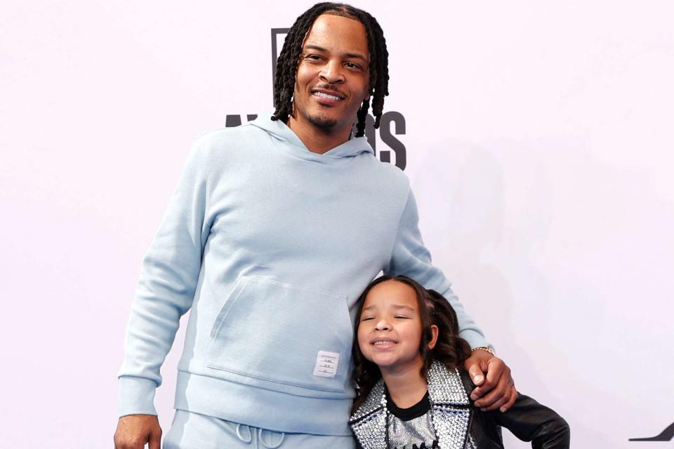 <p>MICHAEL TRAN/AFP via Getty</p> T.I. and daughter Heiress Harris